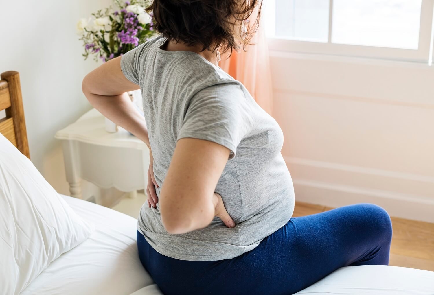 How to Relieve Back Pain During Pregnancy – Get Natural Motion